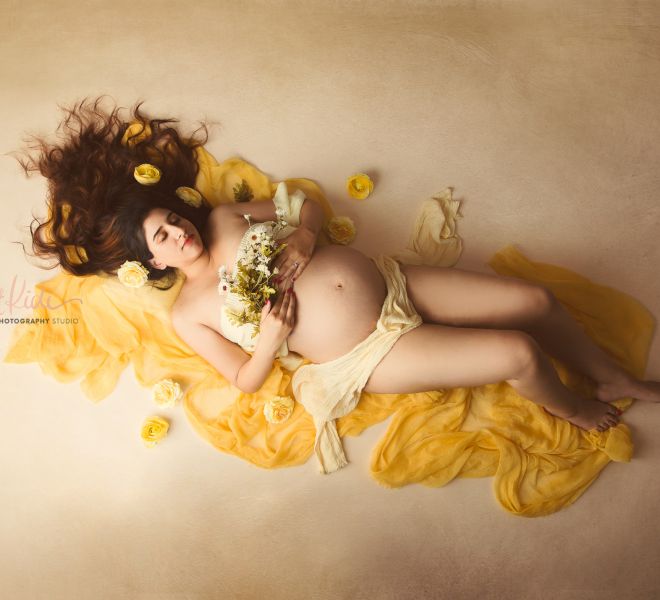 Yellow Bright Moody Maternity Photo with Floral Background